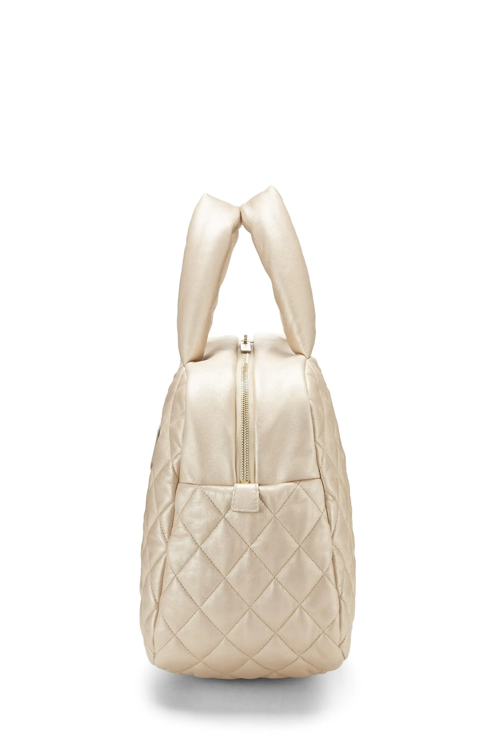 Chanel,  Gold Leather Coco Cocoon Bowling Bag, Gold